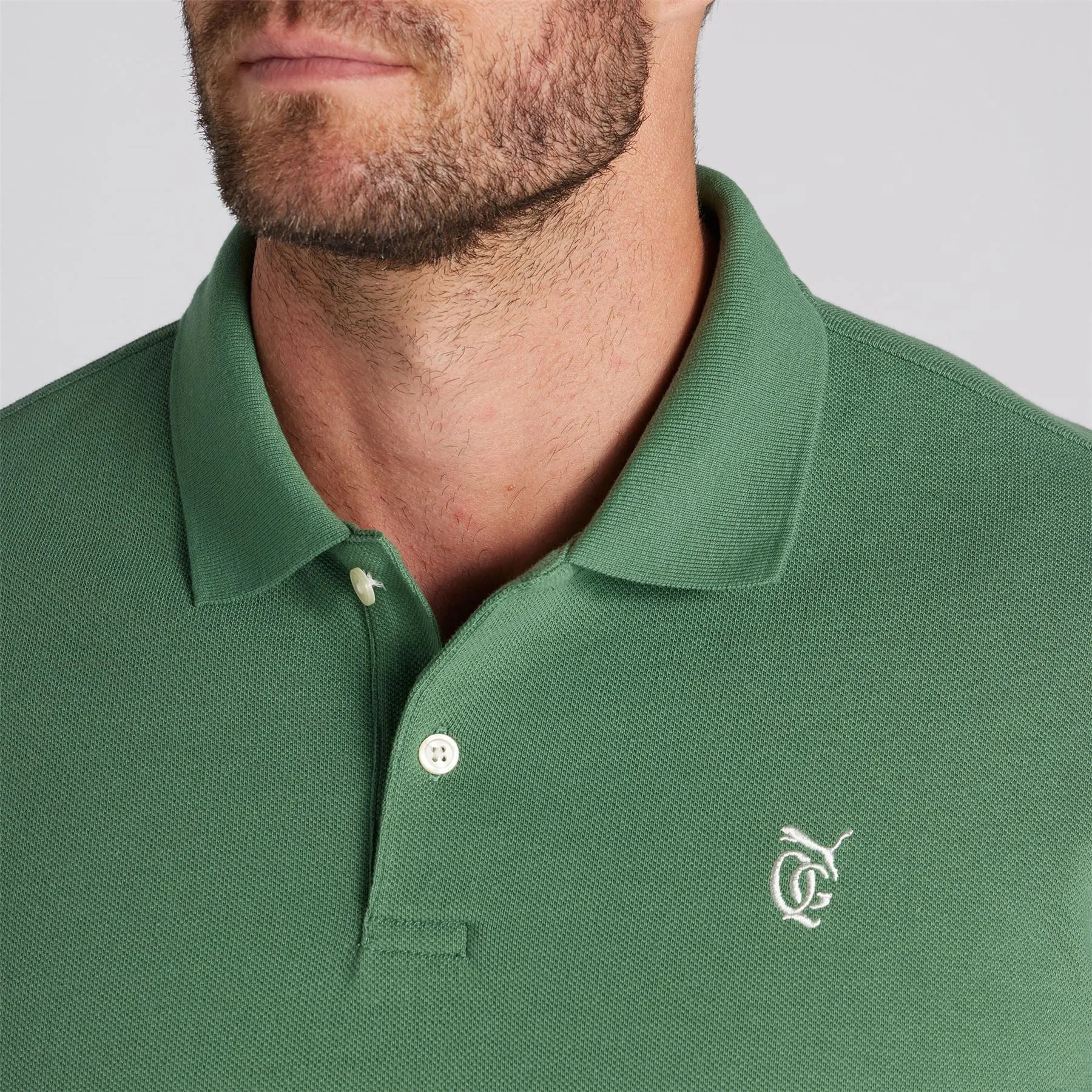 X QGC Post Round Polo Deep Forest - SS24